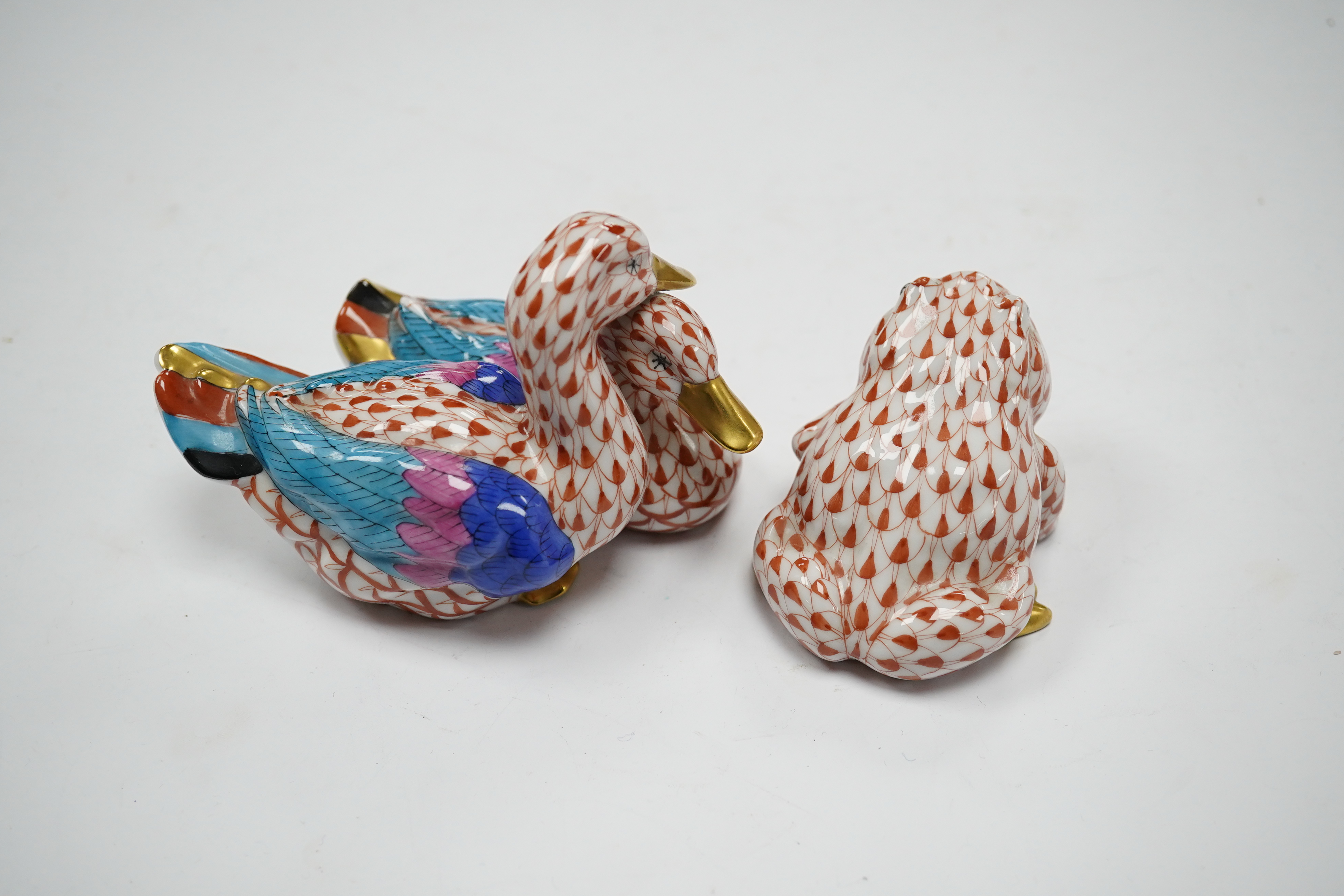 Two porcelain Herend red scale animal figures comprising a duck group and a toad, largest 11cm wide. Condition - good